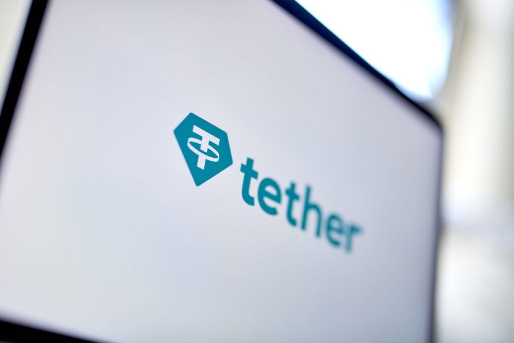 Tether and XREX Group partnership represented with digital currency symbols and a world map.